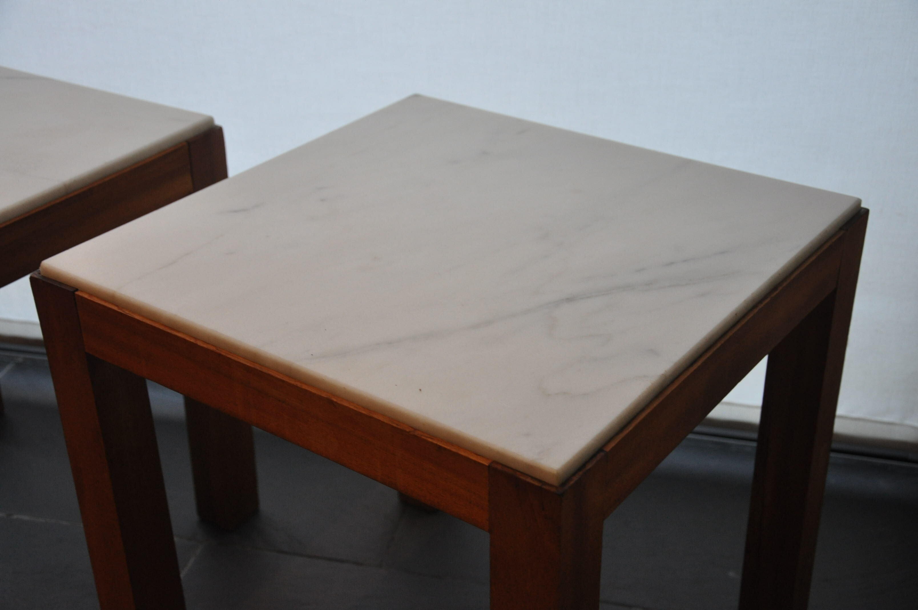 Pair of wooden and marble side tables