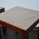Pair of wooden and marble side tables