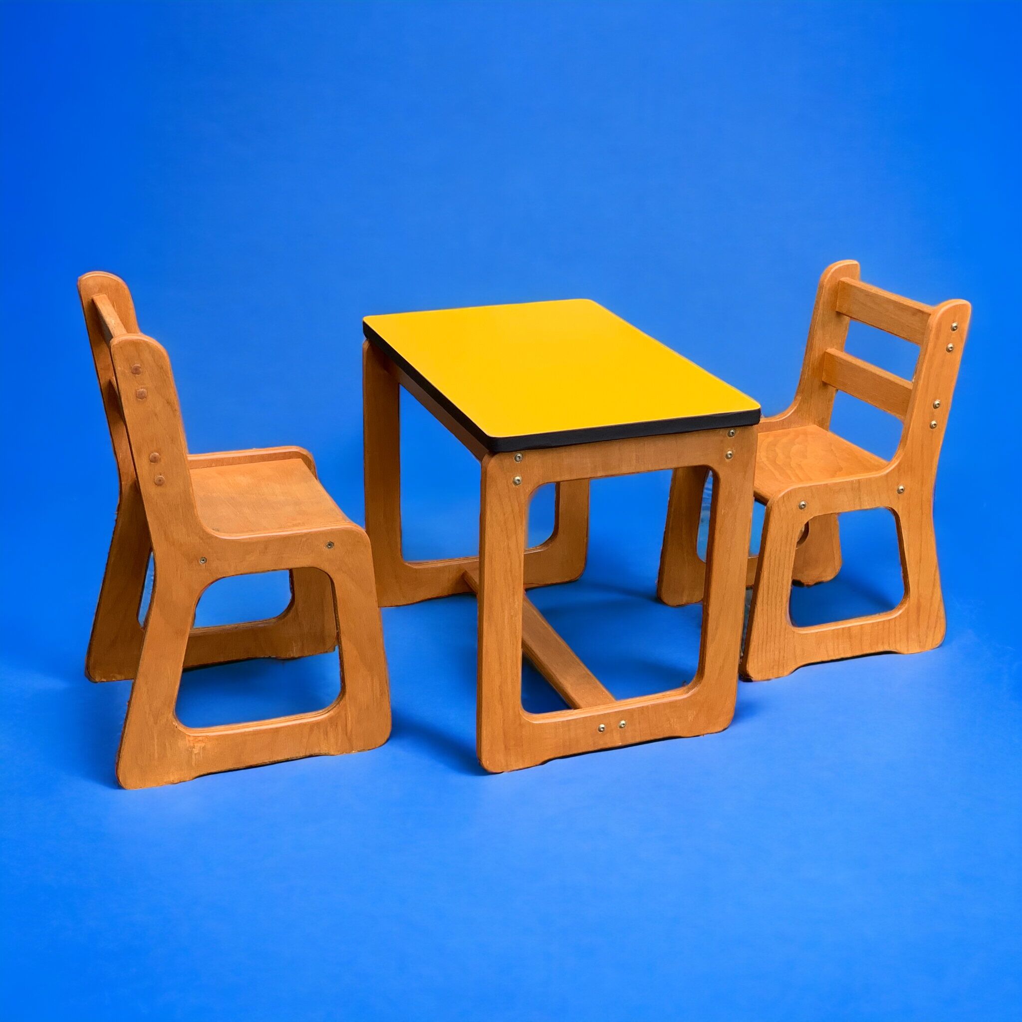 Children's wooden and formica desk and sled chairs 1970