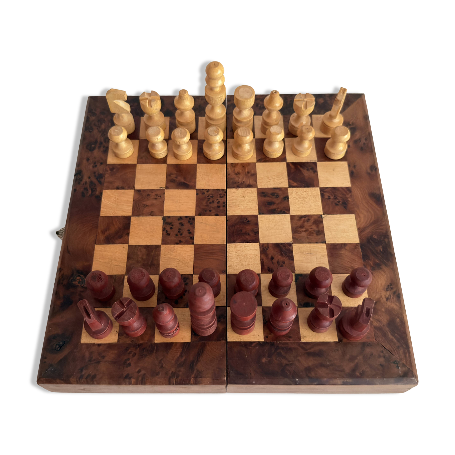Old wooden chess set with a folding wooden box.