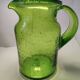 Bubble glass pitcher in the style of Biot or Empoli.