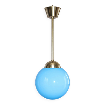 A pendant lamp with a blue glass shade, 1940s.