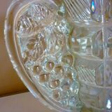 Thick, molded glass ear vase, art deco period and style, stylized leaves and grapes
