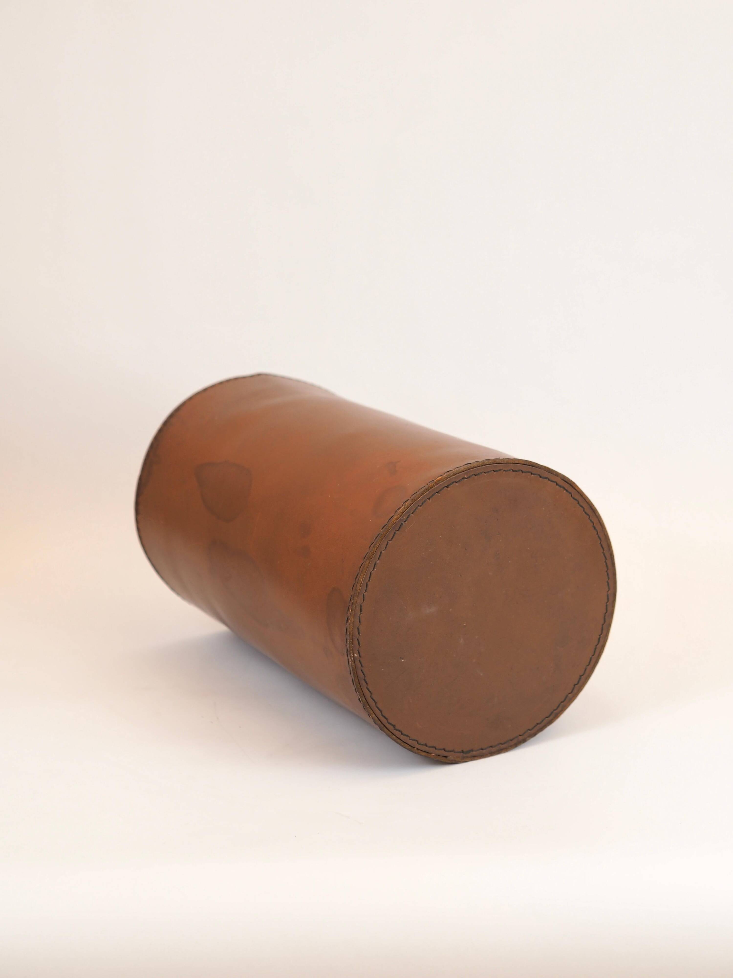Authentic leather wastebasket/bin by Carl Auböck from the mid-20th century.