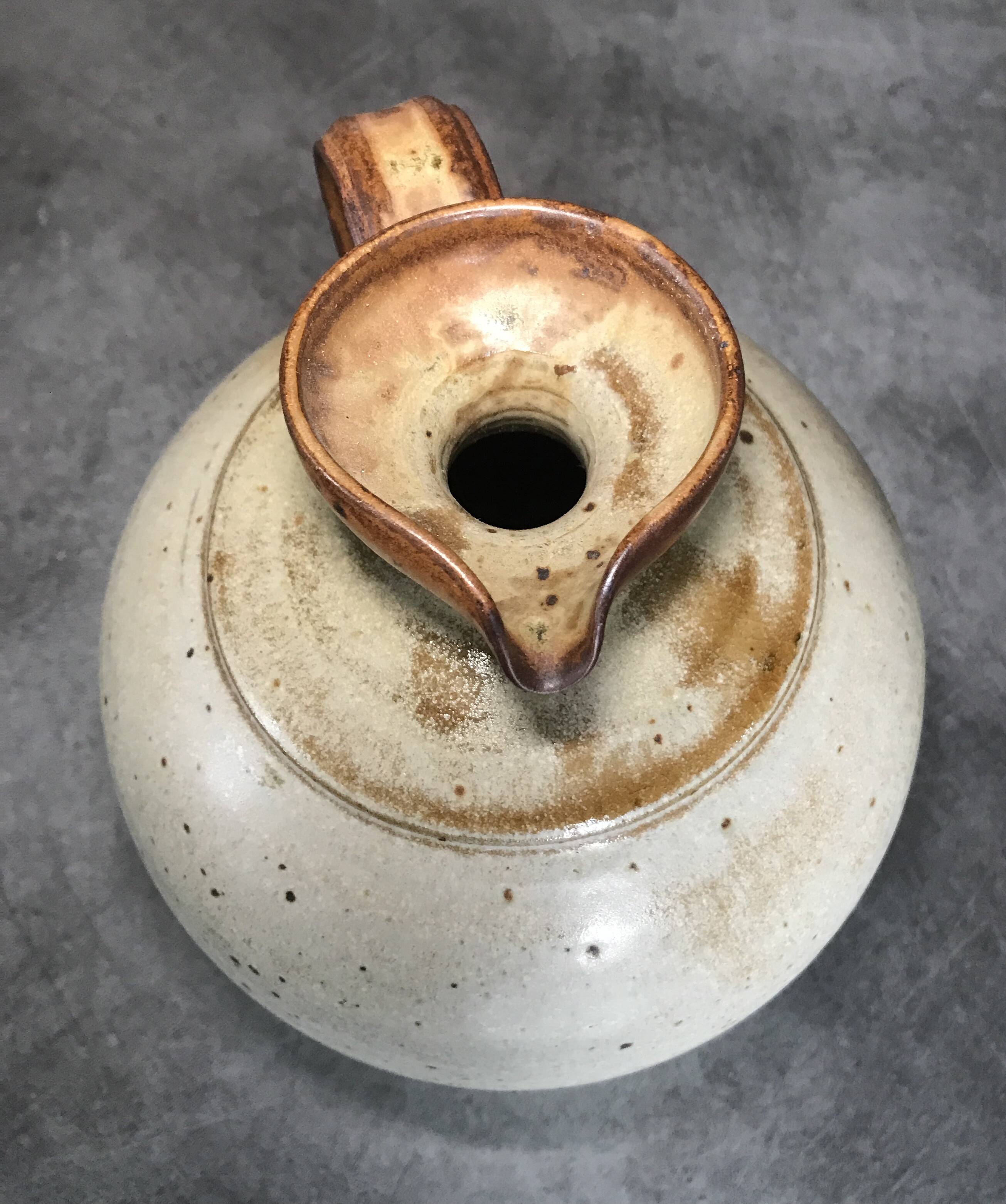 Pyrite stoneware ball pitcher signed Jean-Pierre Prudhomme