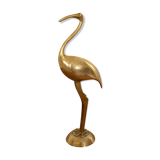 Pink flamingo in golden brass