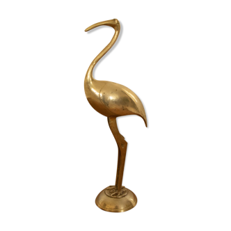 Pink flamingo in golden brass