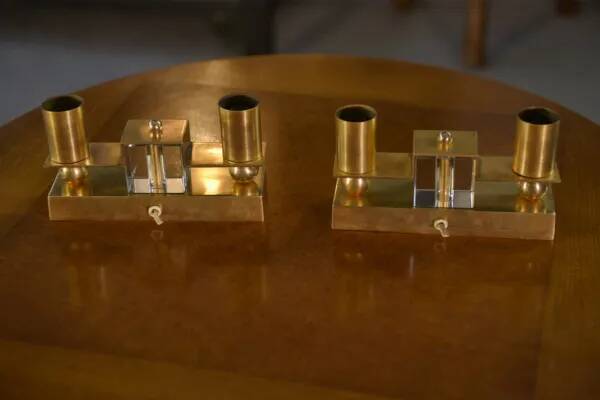 Pair of brass and Bohemian crystal wall lights in the style of Jean Royère, 1940s