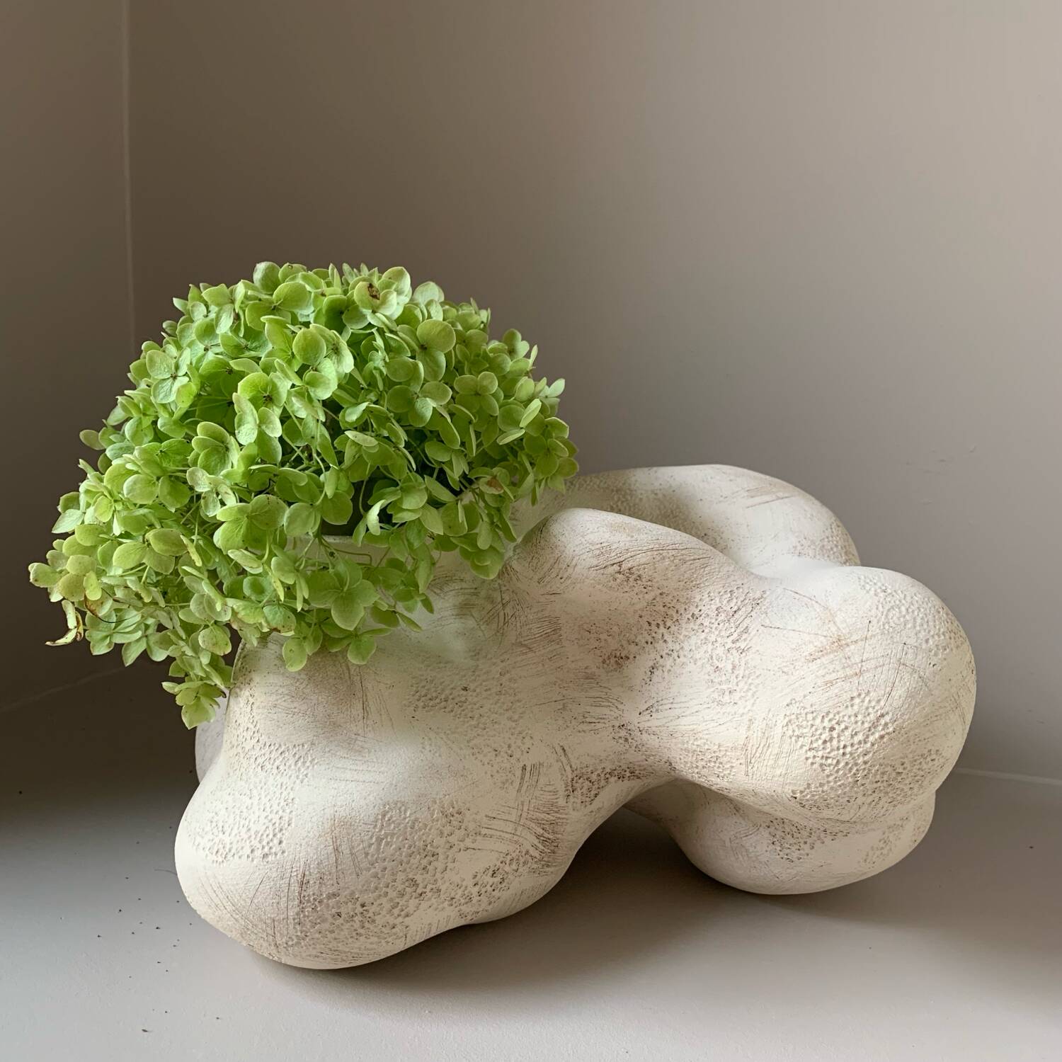 White stoneware vase organic shape