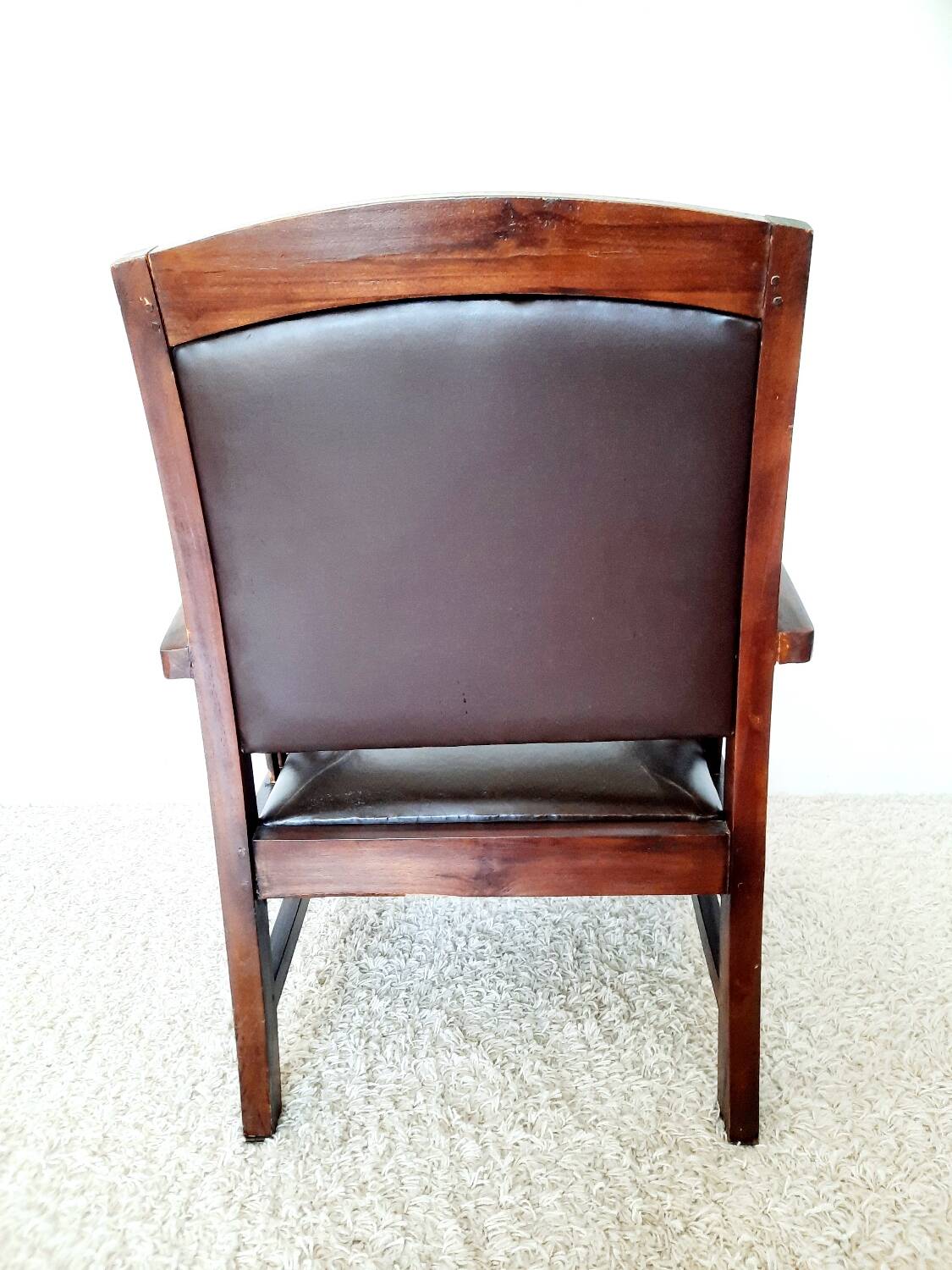Colonial style wooden armchair