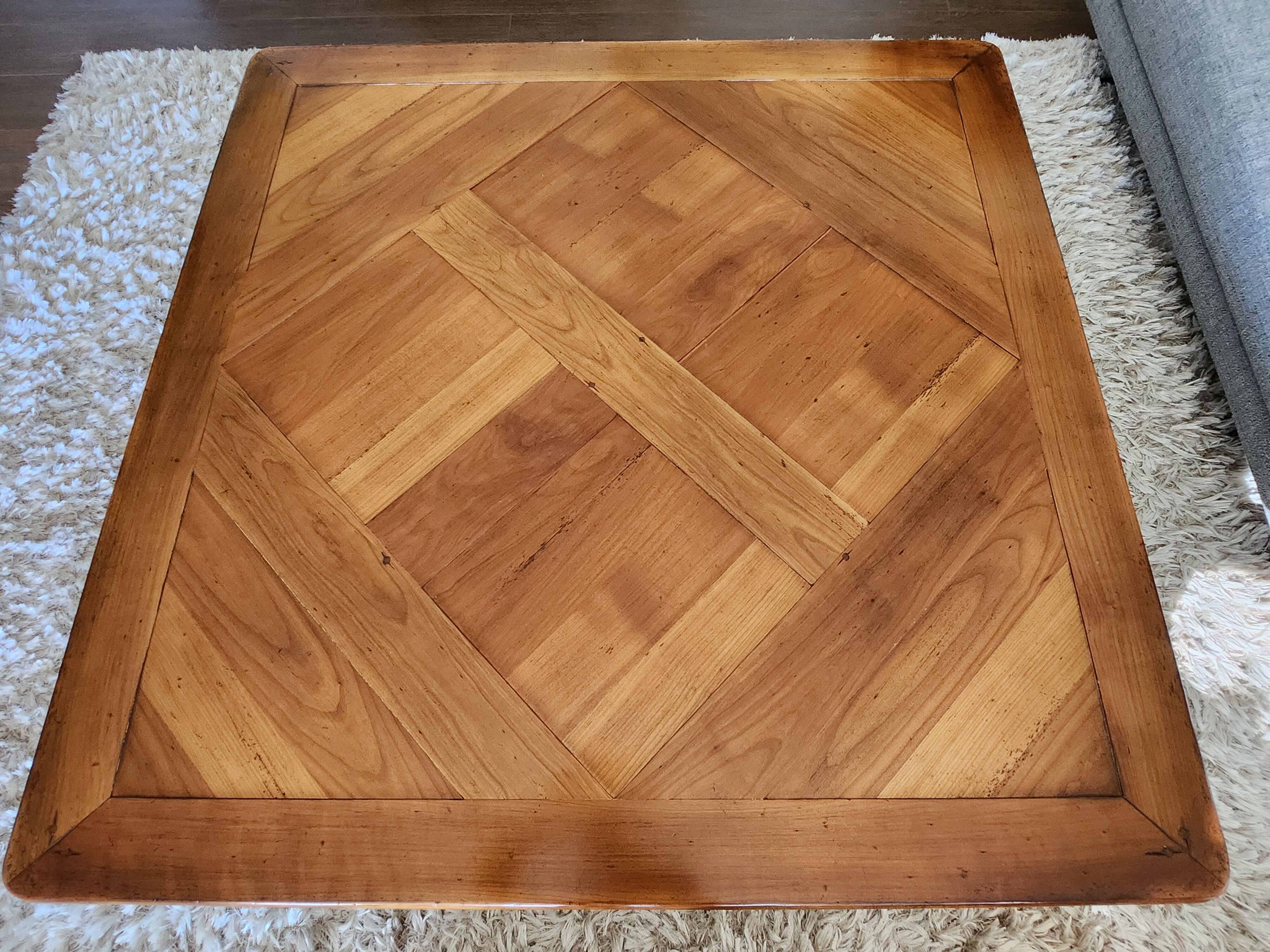 Square coffee table in cherry Roche Bobois