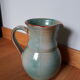 Pitcher with handle green celadon turquoise and caramel