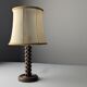 Charles Dudouyt oak table lamp with parchment shade, France, 1950s