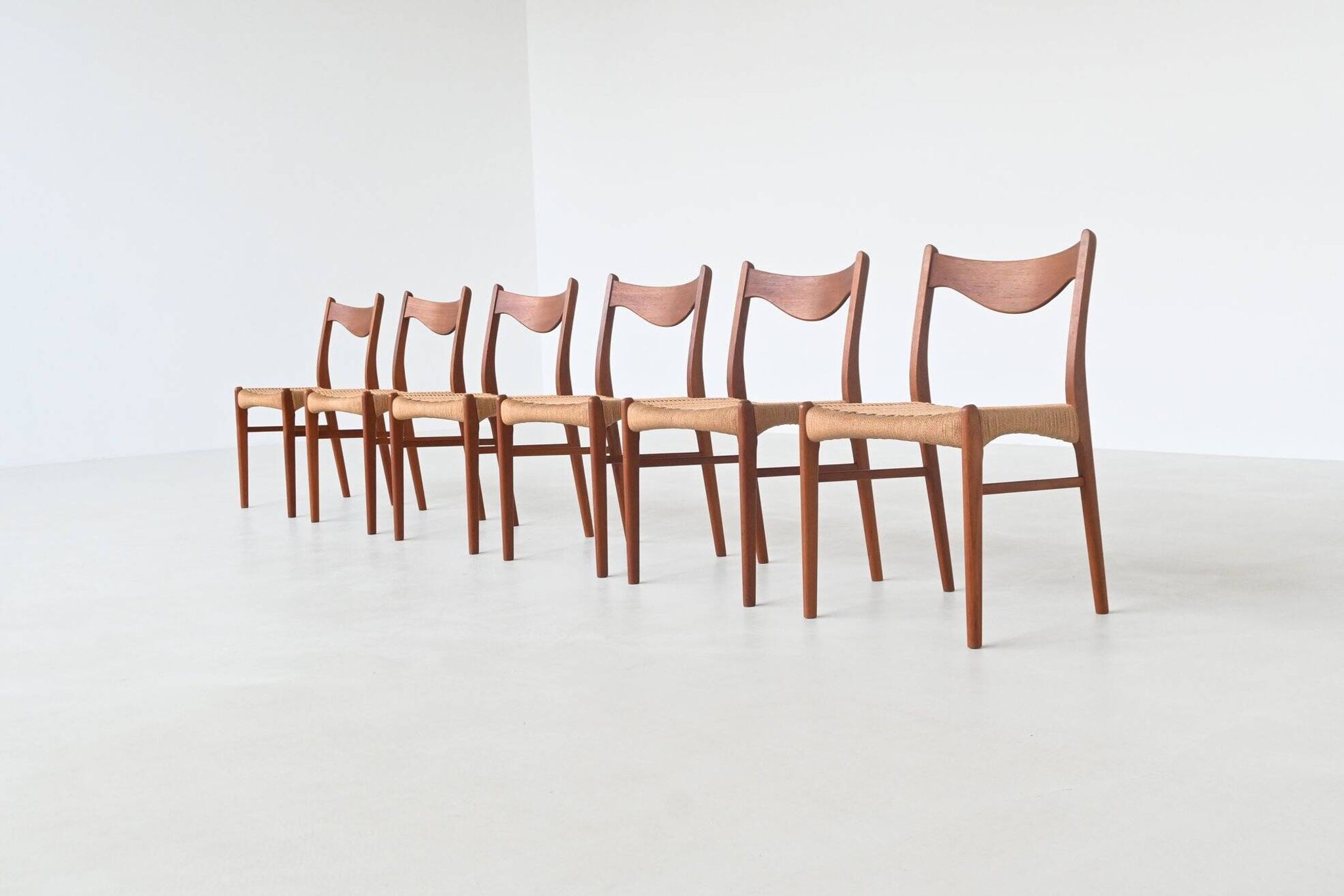 Arne Wahl Iversen set of six dining chairs in teak Glyngore Denmark 1960