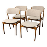 A set of four vintage teak dining chairs