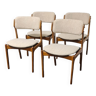 A set of four vintage teak dining chairs