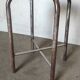 Old vintage metal and wood industrial workshop stool
