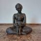 Terracotta statue of a woman with child, signed
