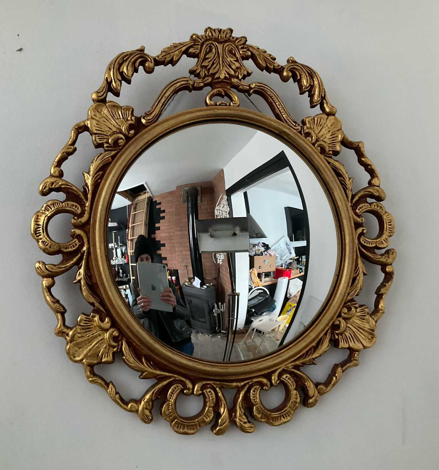 Ancient witch's eye mirror Dollanzo Italy in gilded wood