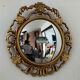 Ancient witch's eye mirror Dollanzo Italy in gilded wood