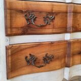 Walnut crossbow chest of drawers