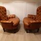 Pair of leather chesterfield chairs