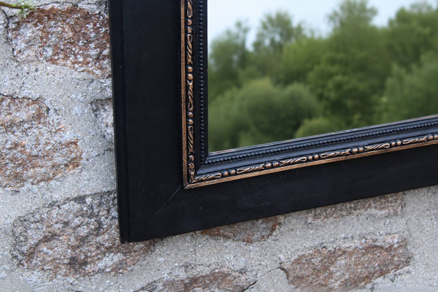 Vintage black and gold wooden mirror with a pediment – Napoléon III style
