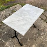 Bistro table with cast iron base, marble top, 20th century