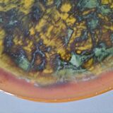 Set of 4 flamed enamel plates in green and amber from the 60s-70s.