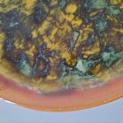 Set of 4 flamed enamel plates in green and amber from the 60s-70s.