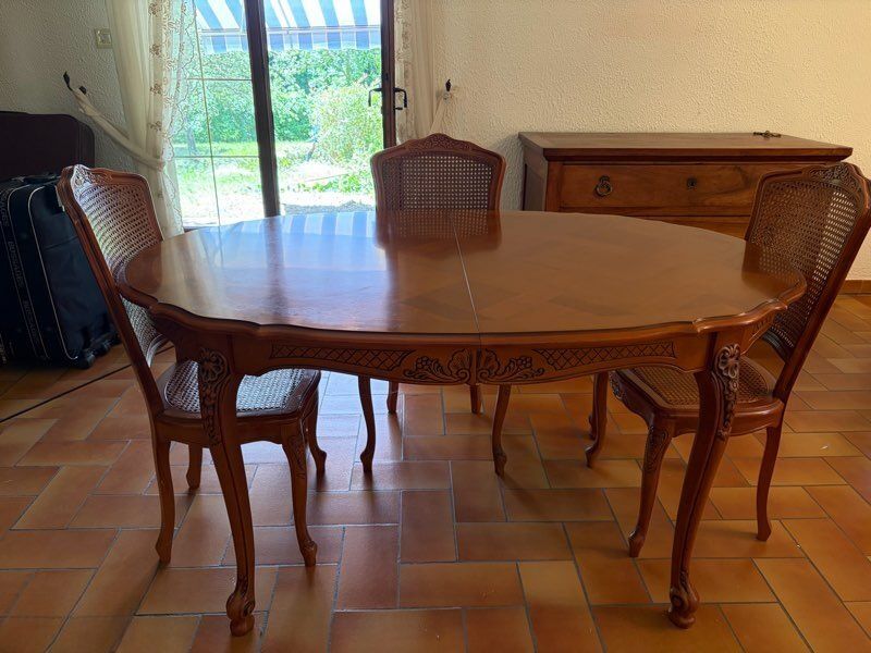 Oval table in Louis XV style and chairs