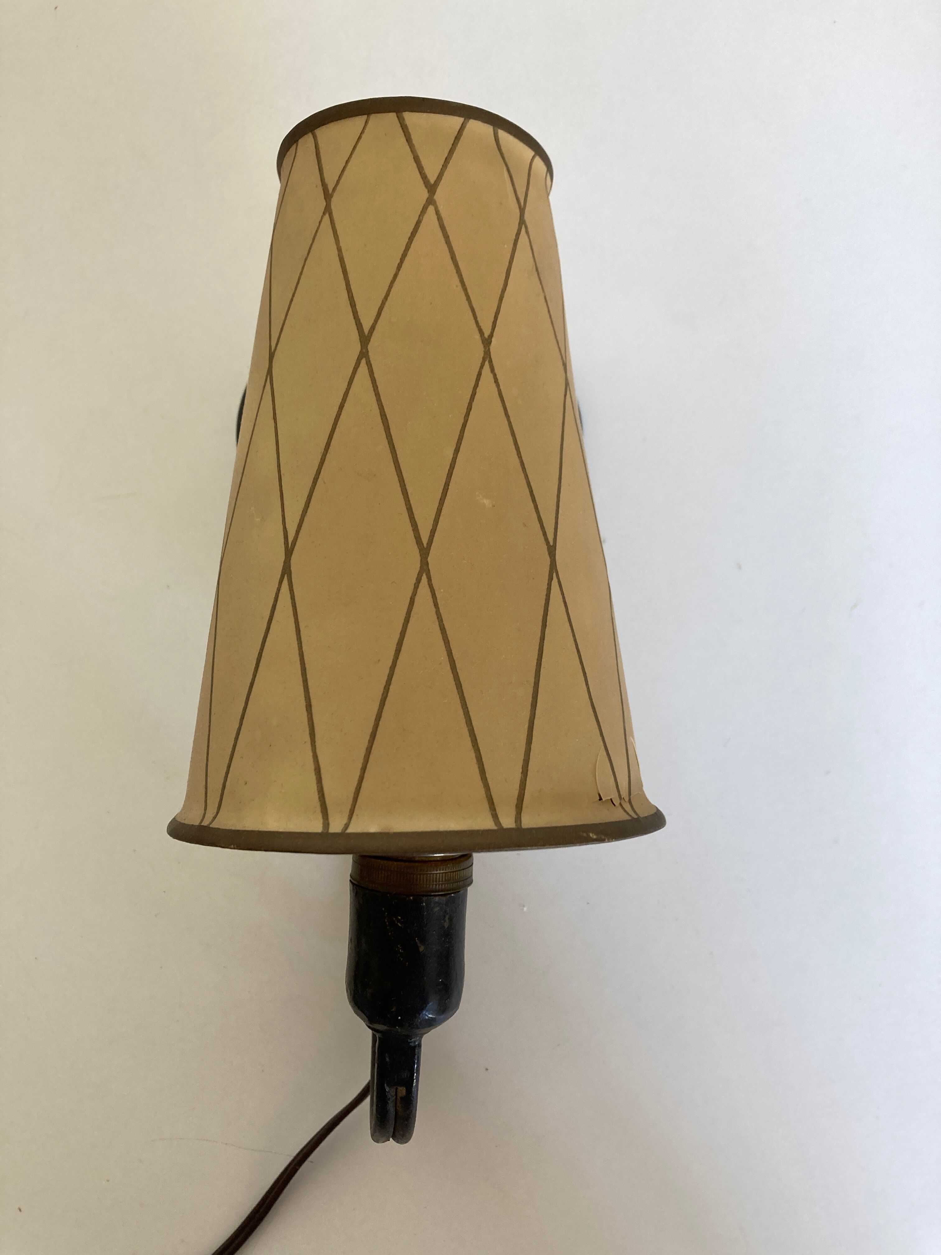 Art deco beaten iron wall lamp