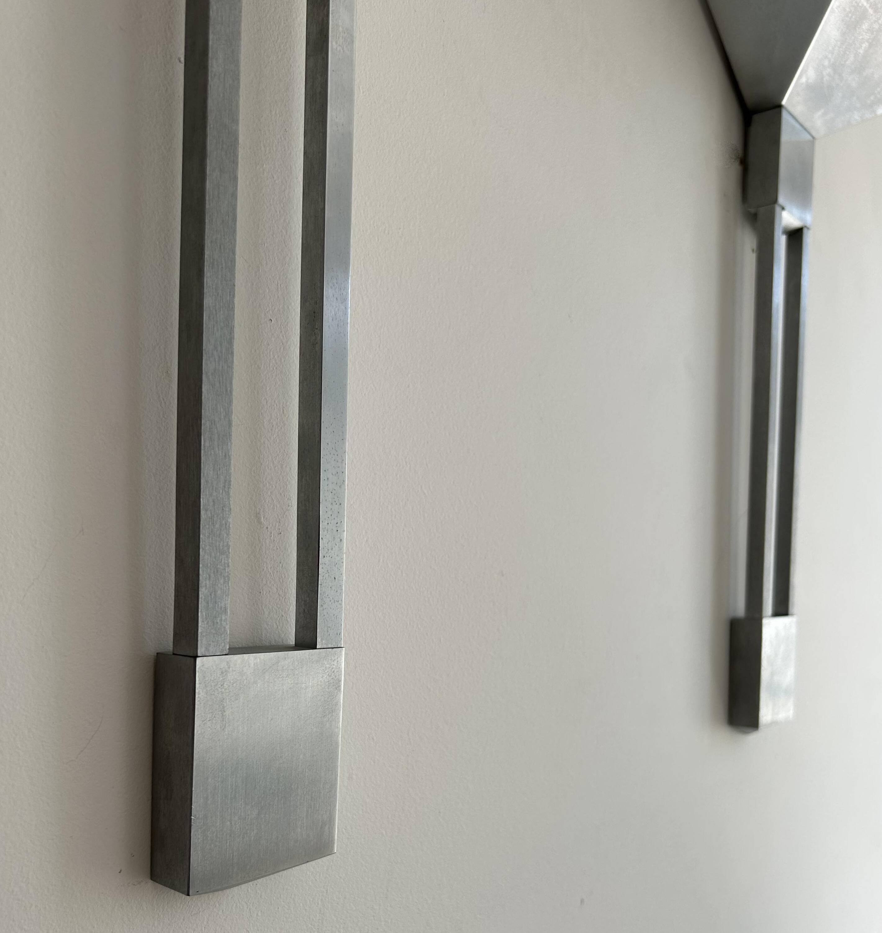 Pair of vintage geometric Vereinigte Werksatten wall lights, solid aluminum, Germany 1970s