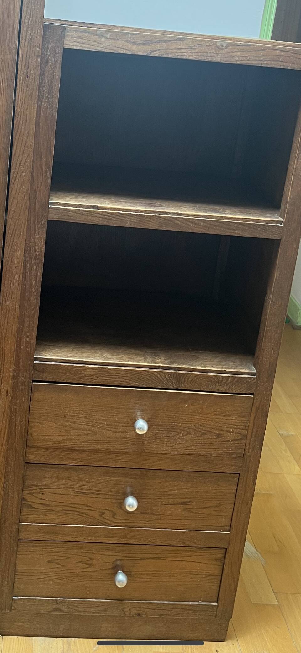 Wooden cabinet with drawers and shelves