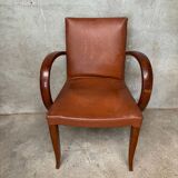 Brown leather effect Skaï bridge armchair