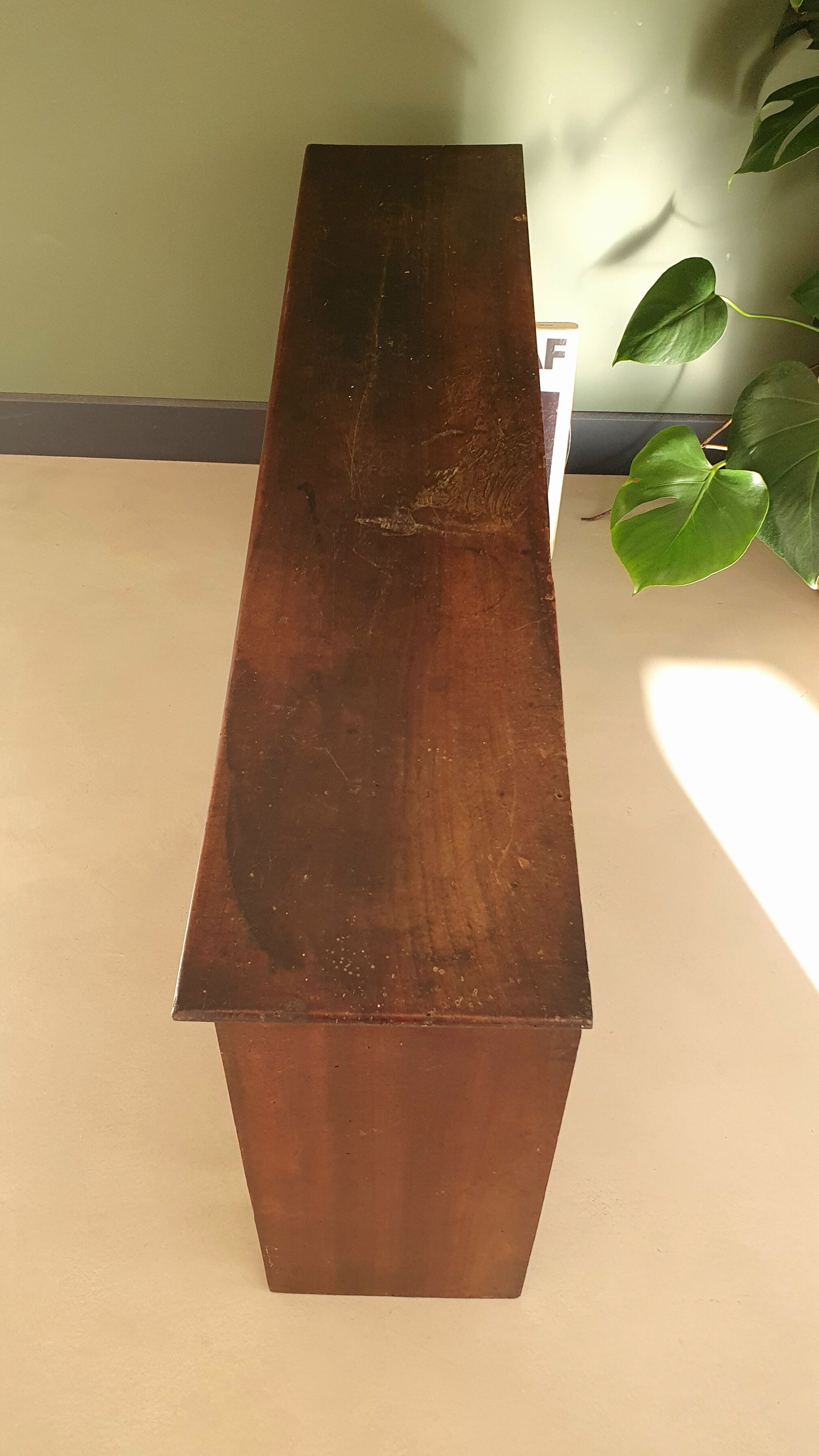 Low antique wooden storage unit