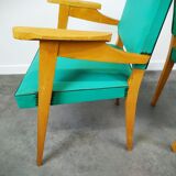 Pair of wood and vinyl armchairs