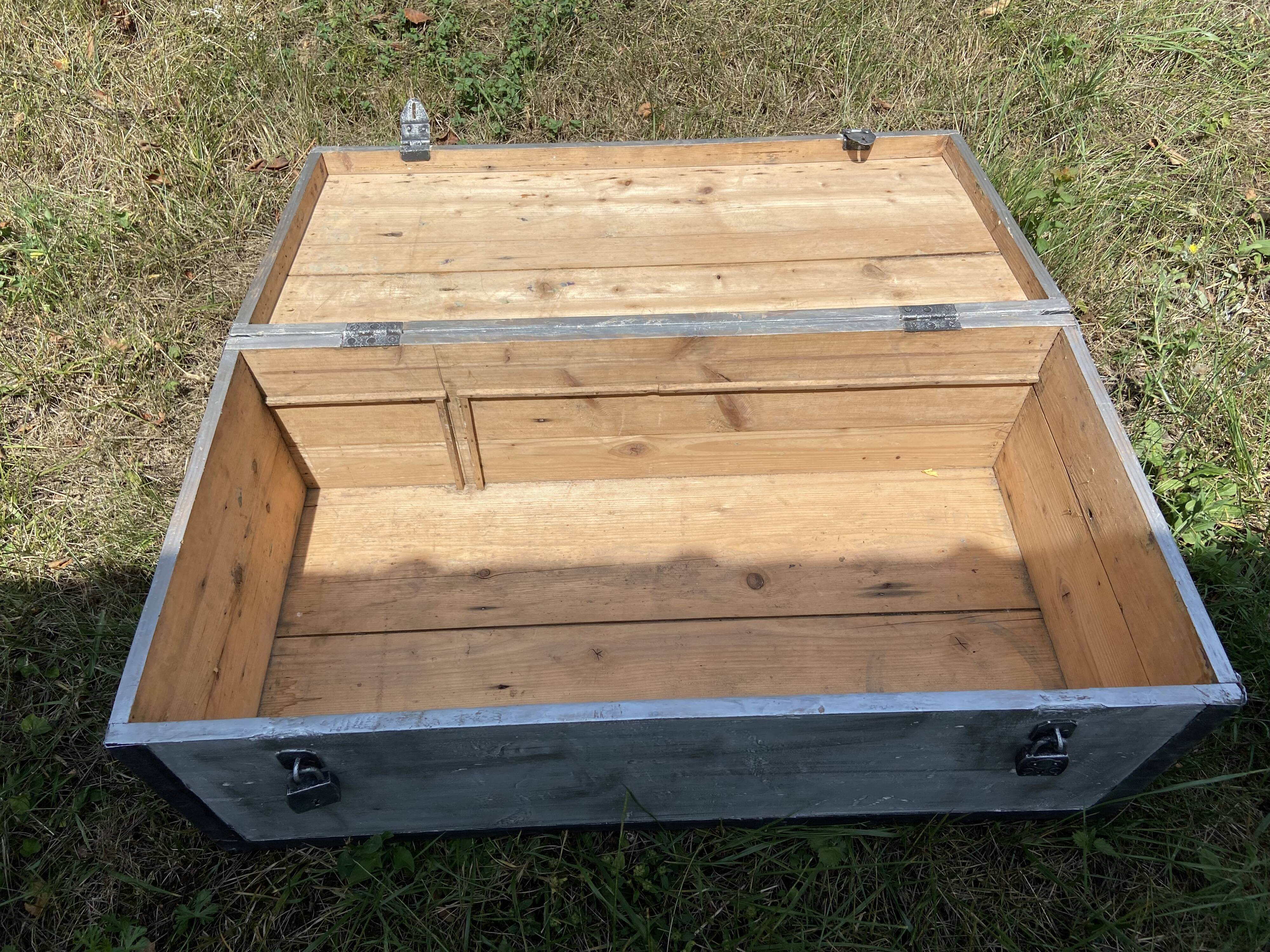 Restored wooden trunk patinated grey