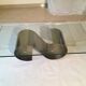 Table basse moderniste en acier et verre