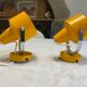Pair of adjustable vintage wall lamps in yellow and chrome metal. Year 60
