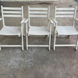 Folding wooden armchairs