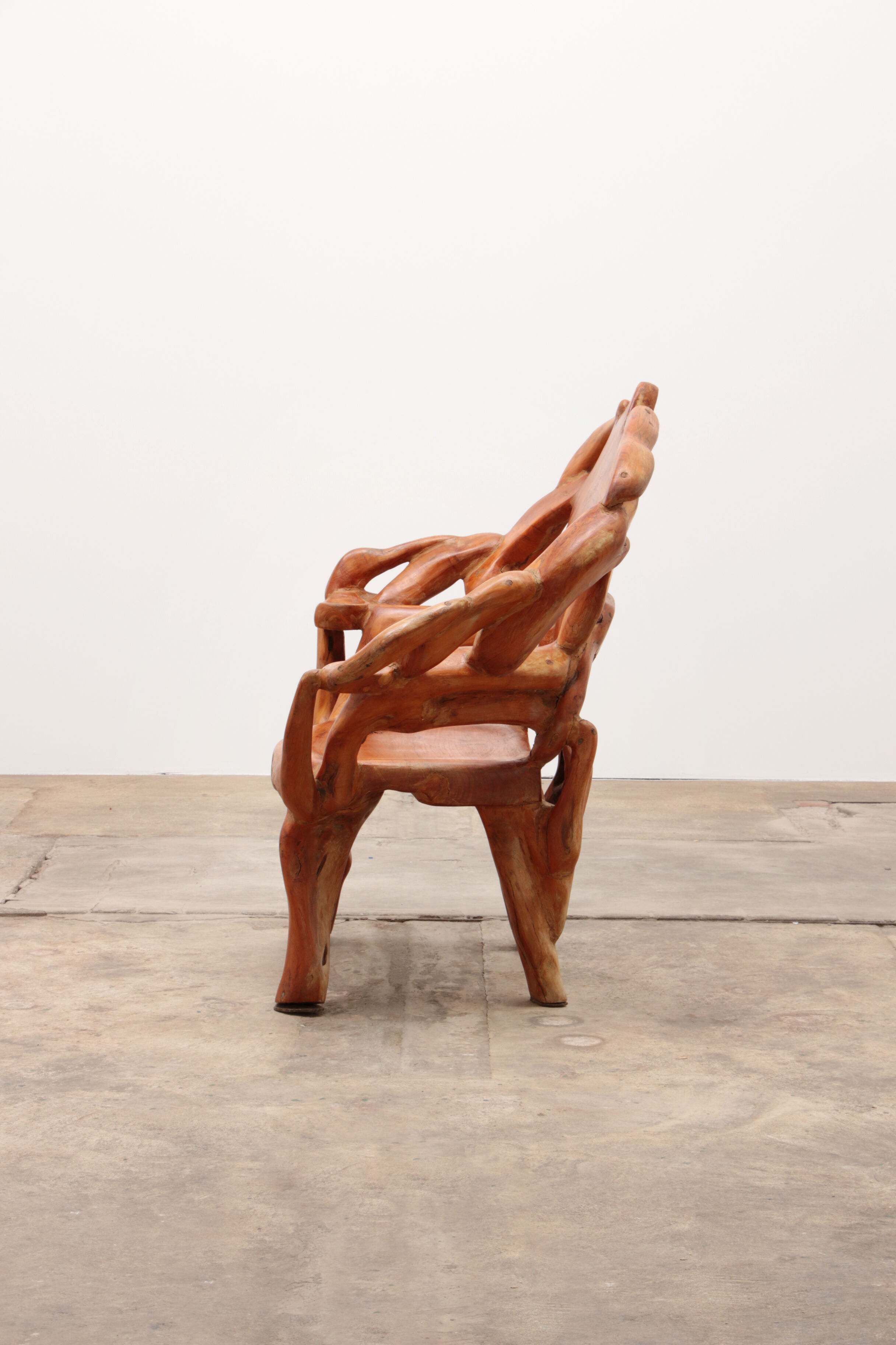 Robust armchair made of recycled wood