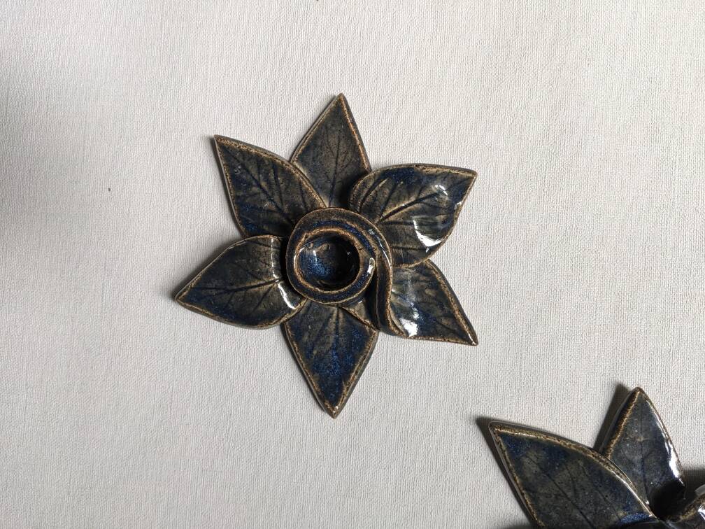 Pair of handcrafted ceramic candlesticks inspired by plants