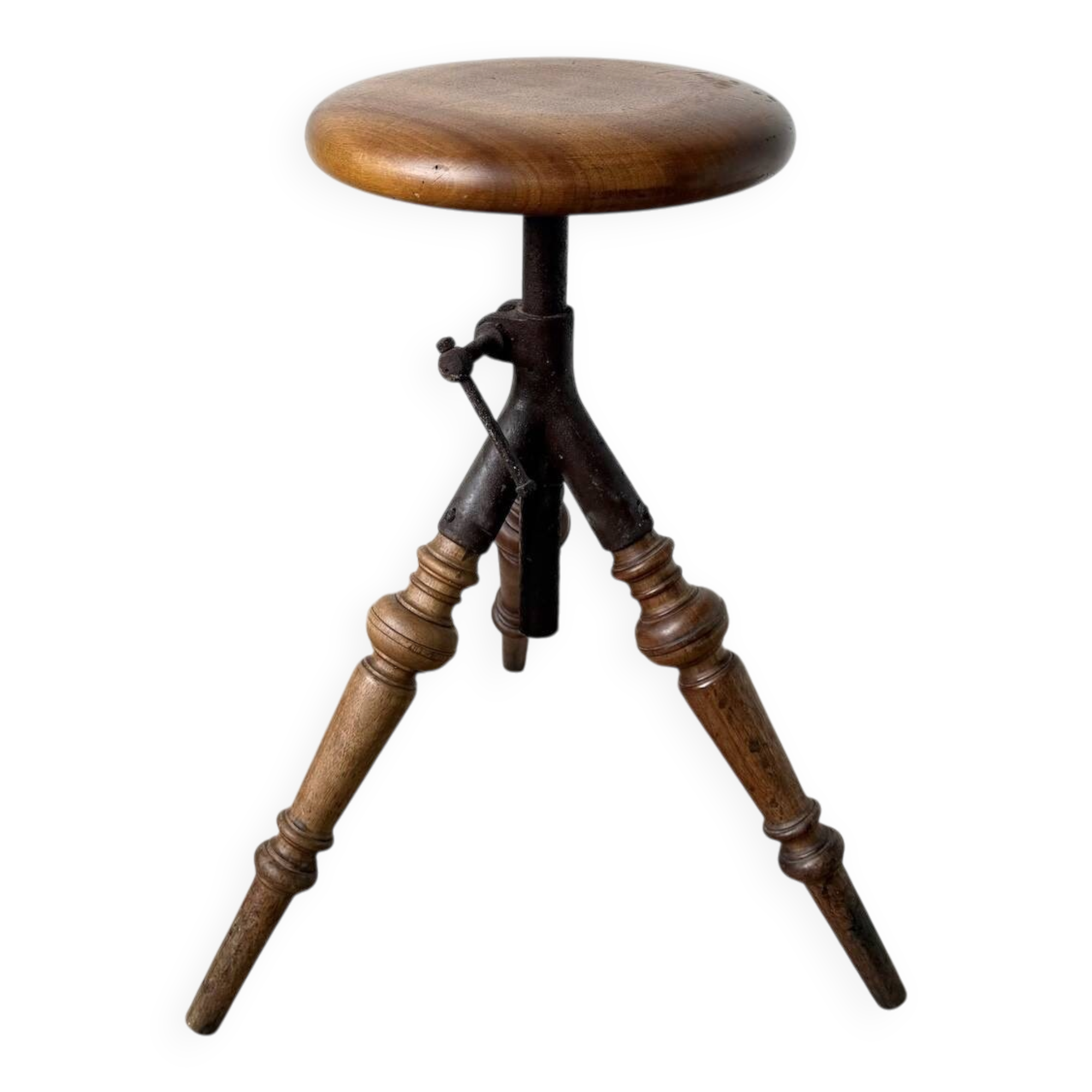 Tripod workshop stool in turned wood and cast iron — circa 1900