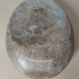 African stone face sculpture