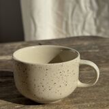 Set of 4 vintage speckled beige stoneware coffee cups.