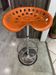 Orange tractor stool, pivoting adjustable mower, Fermigier Mirima 70.