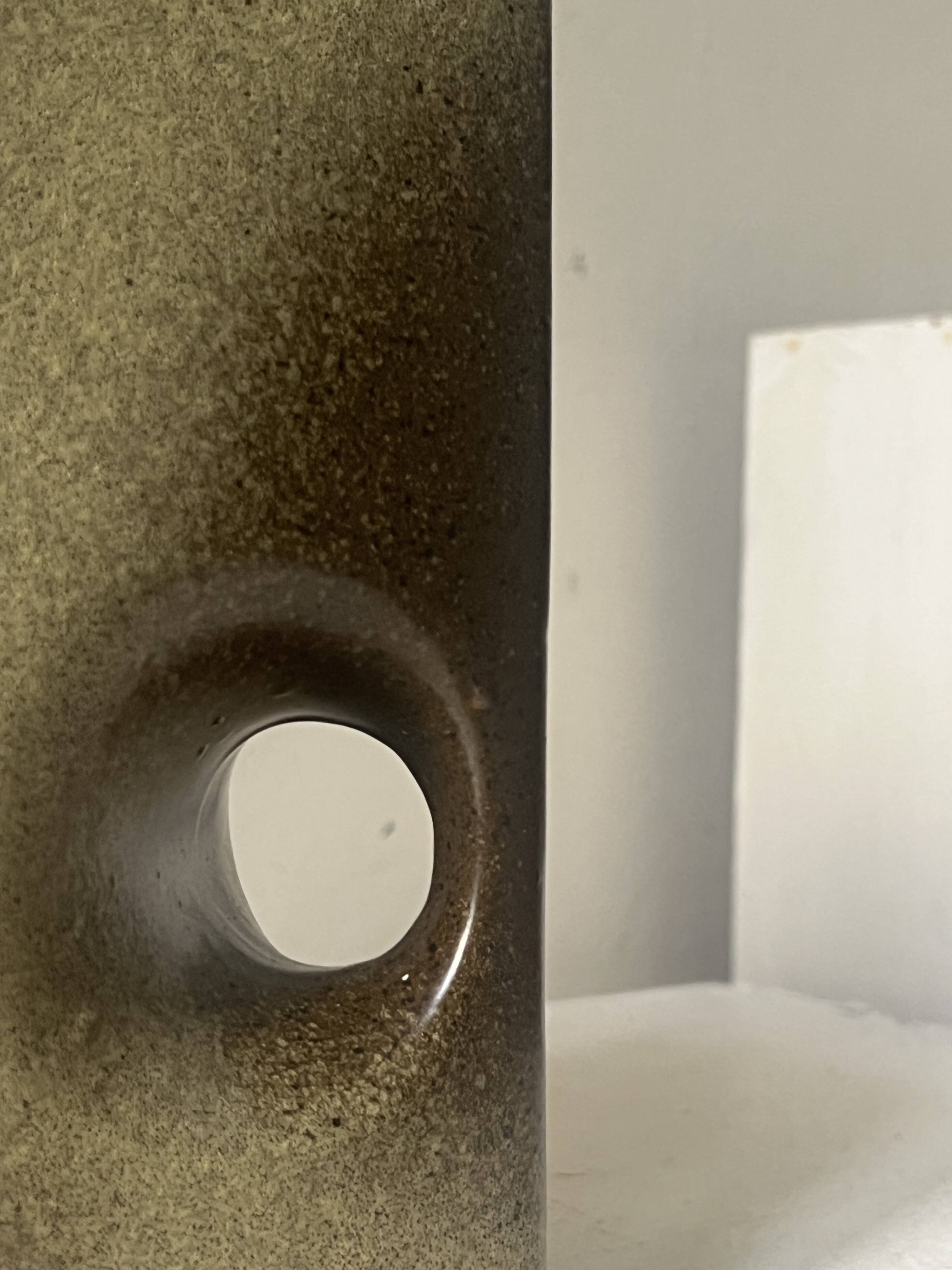 The modernist vase is German, VEB Haldensleben Fat Lava 1970.