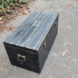 Old wooden trunk with interior compartments