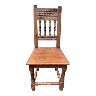 Rare high chair from the 16th/17th century in solid oak.